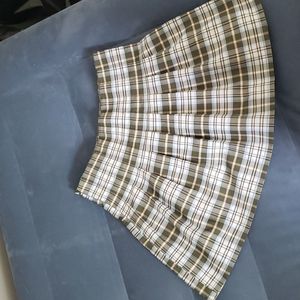 Pleaded skirt. Super cute. Worn once. Size small (3-5). Green.